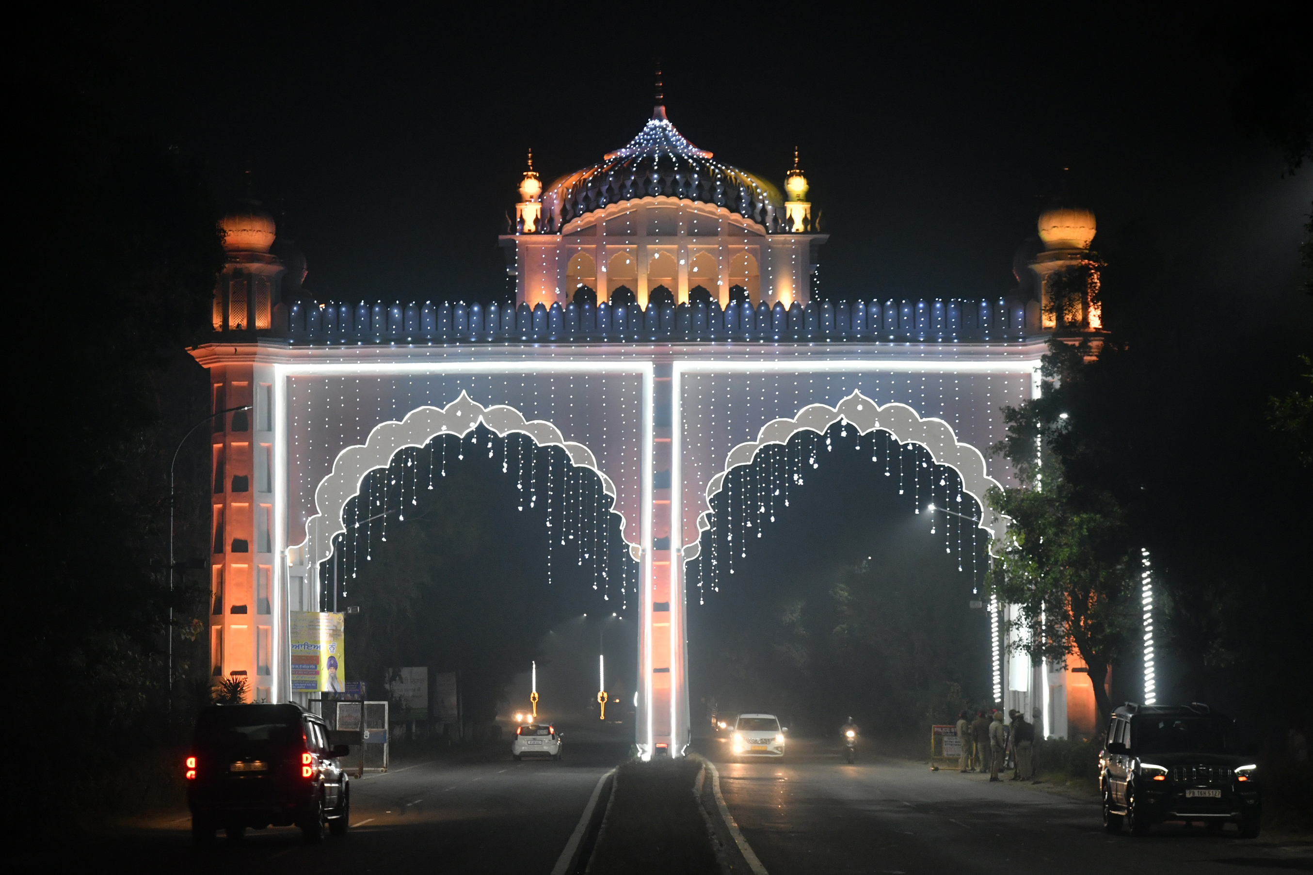 The entry gate of Takht Sri Keshgarh Sahib glows brightly at Anandpur Sahib on Friday evening. Tribune photo: Pardeep Tewari
