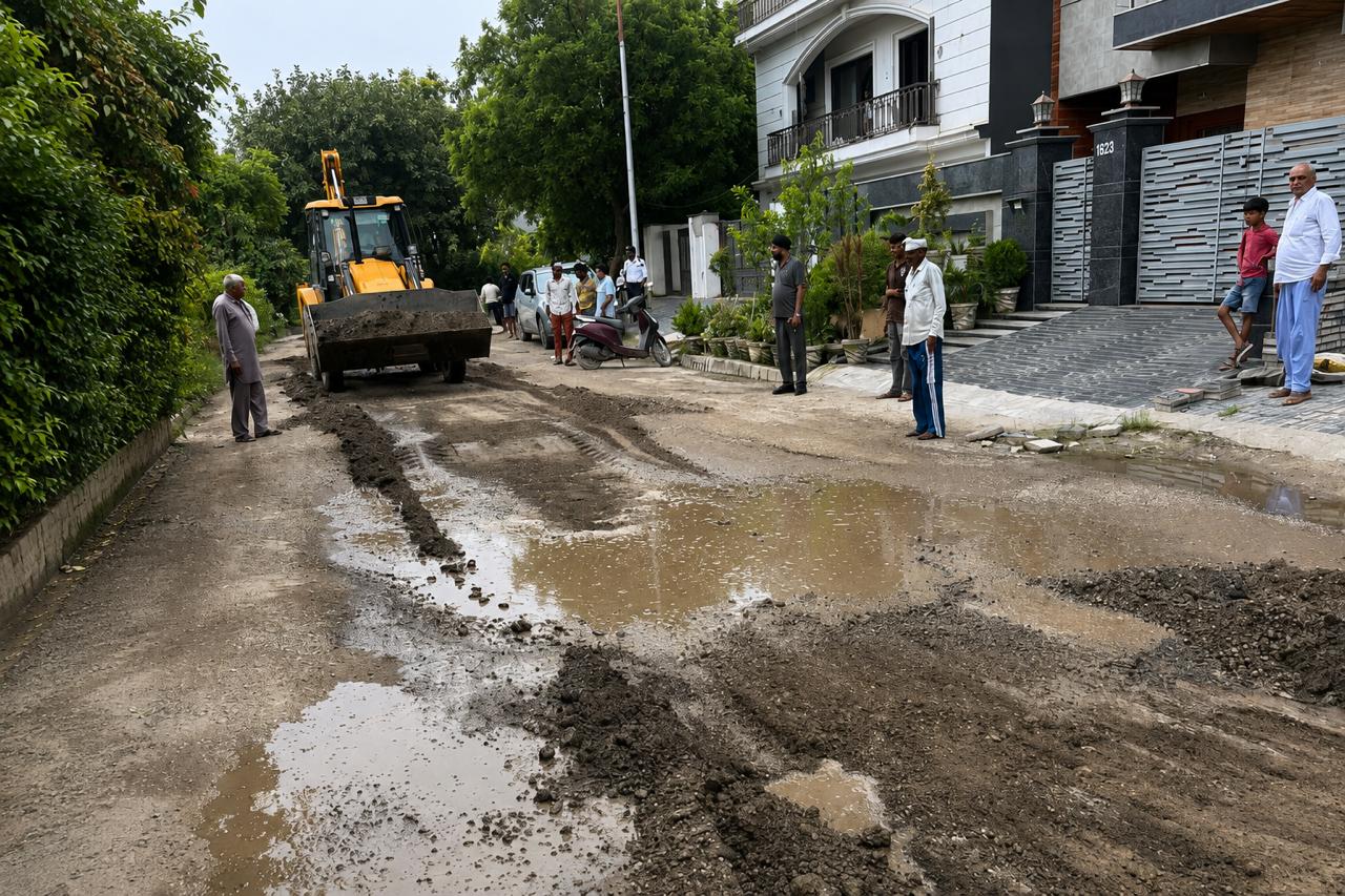 Karnal’s Alpha City residents repair pothole-riddled roads themselves