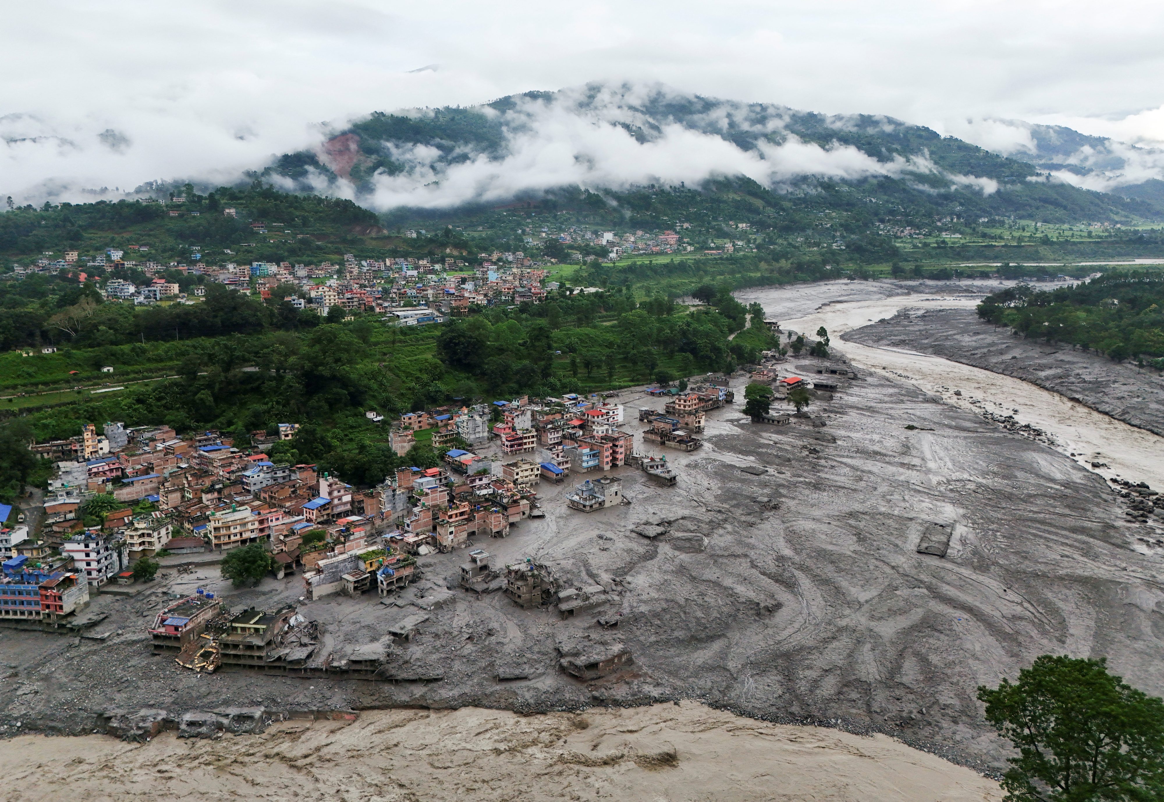 Hundreds missing after flood hits Nepal-Tibet border, 157 bodies recovered