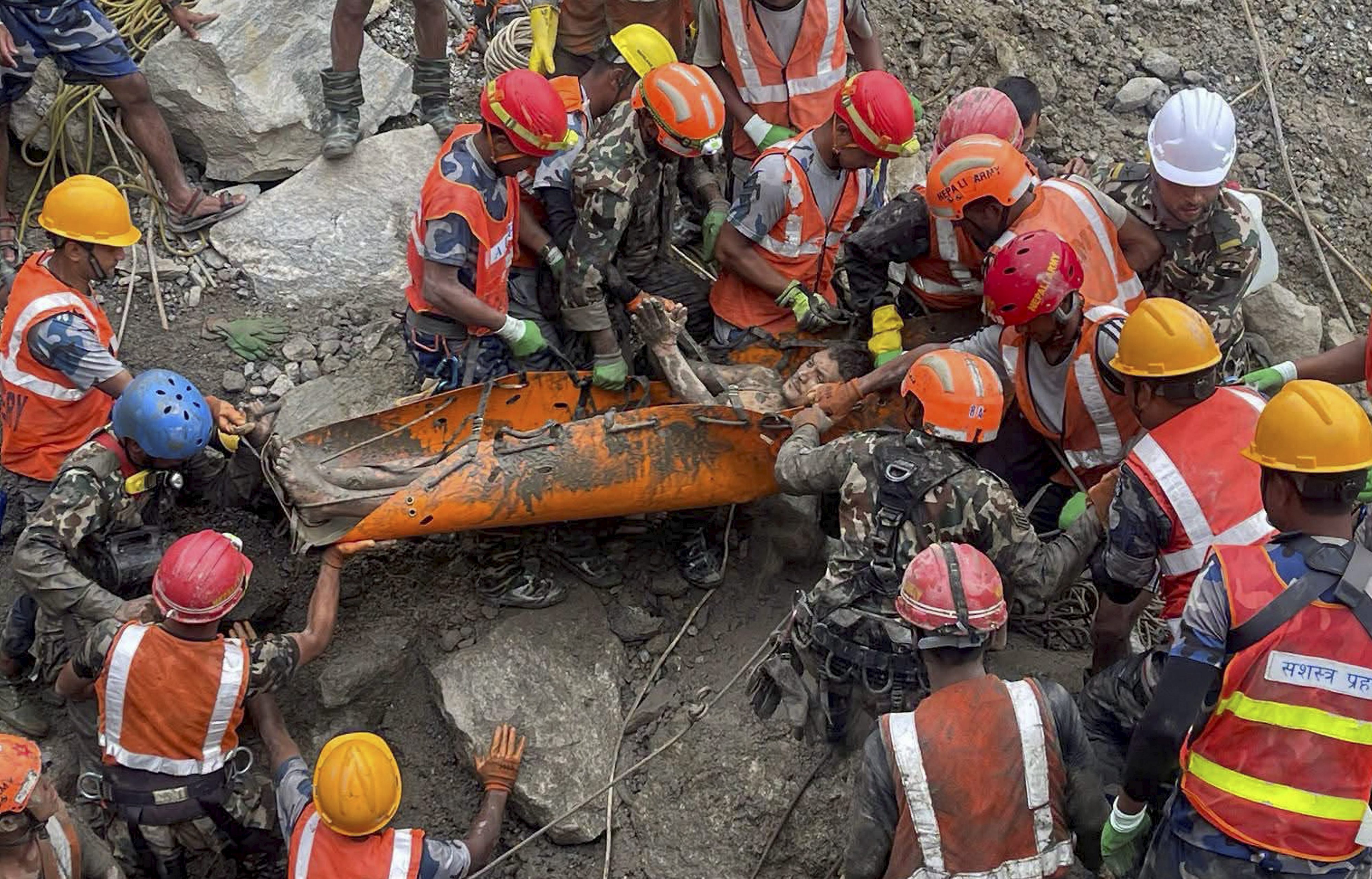Nine days after Nepal deluge, 2 pulled out alive from tunnel