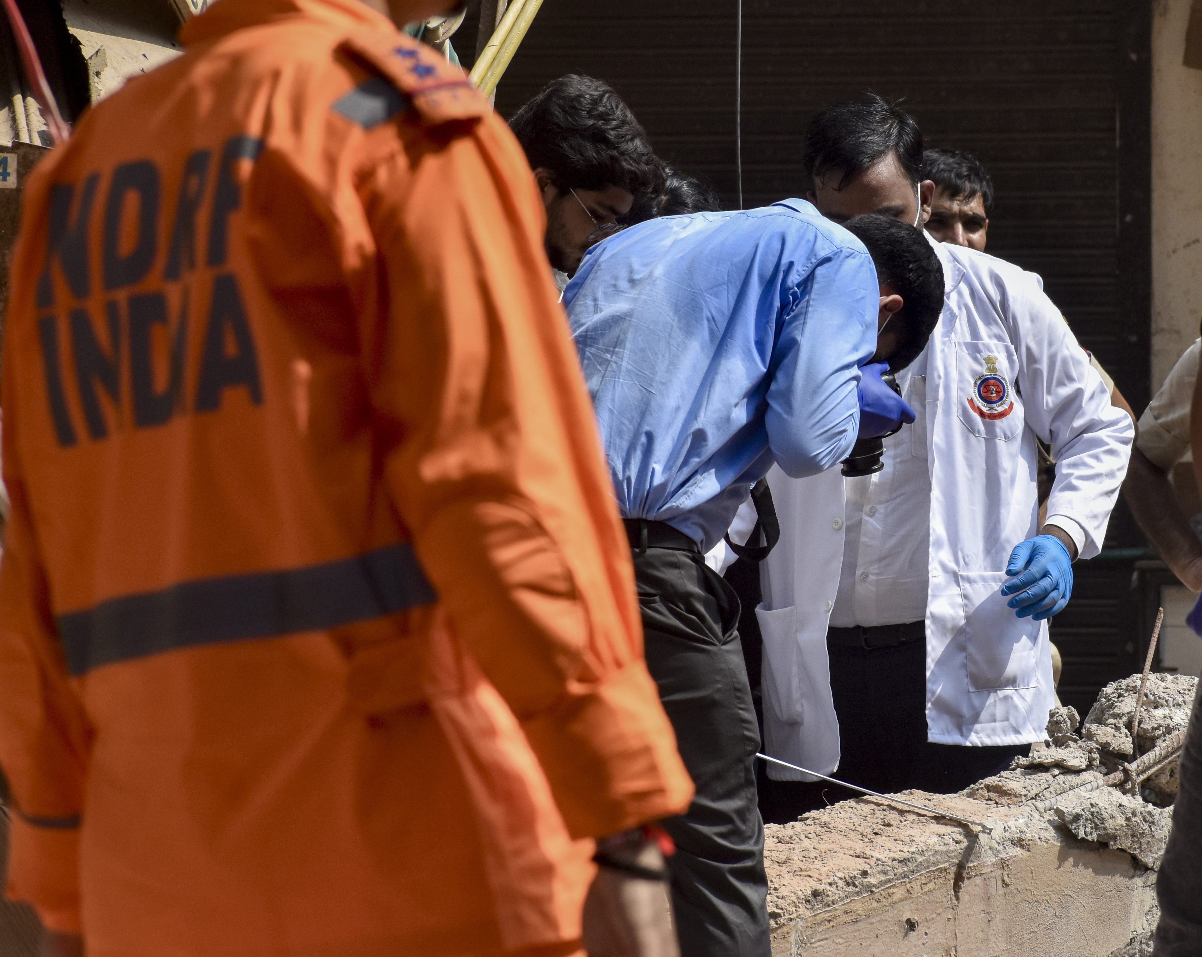 Mole on neck, birthmark on leg helps mother identify son after Delhi building collapse