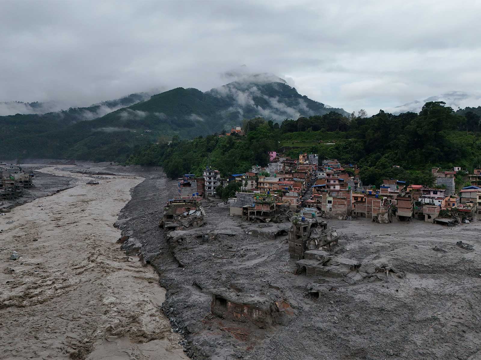 Inks slowly start to fade from faces on wall; one month after Nepal floods